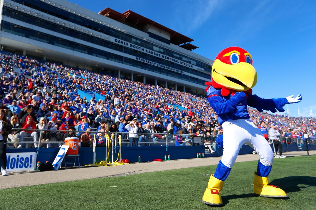 Big Jay plays air guitar during a time out at the Sunflower Showdown between Kansas and Kansas State in 2021 at David Booth Kansas Memorial Stadium.