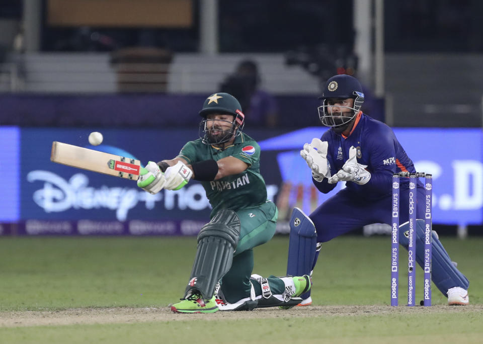 Pakistan's Mohammad Rizwan bats during the Cricket Twenty20 World Cup match between India and Pakistan in Dubai, UAE, Sunday, Oct. 24, 2021. (AP Photo/Aijaz Rahi)