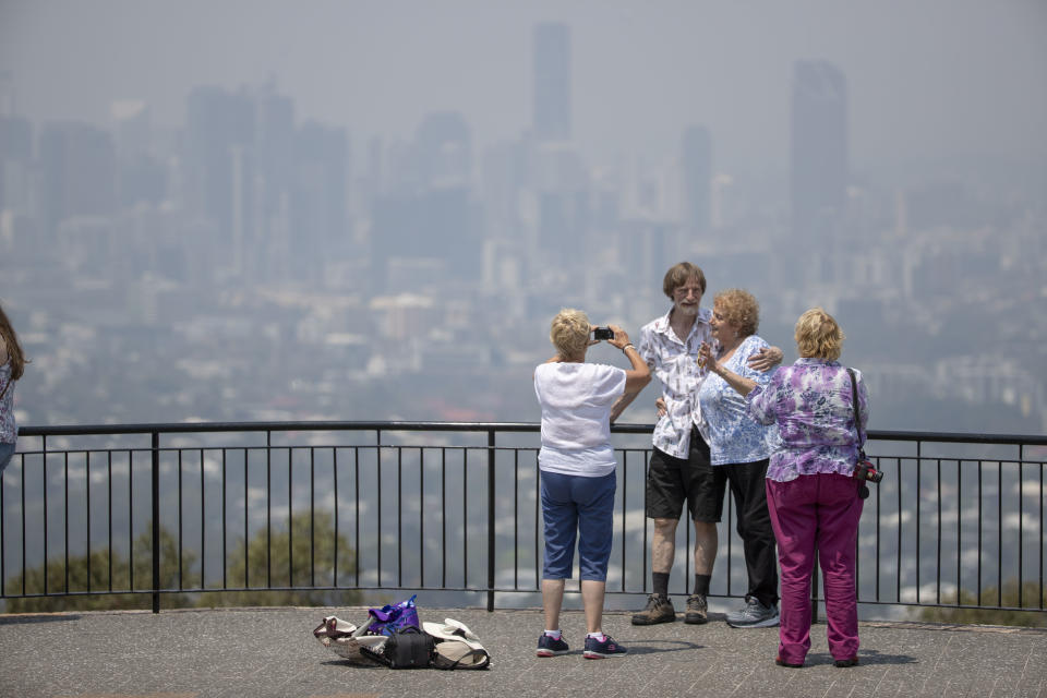 The Brisbane skyline covered in smoke as seen from Mount Coot-tha Lookout.