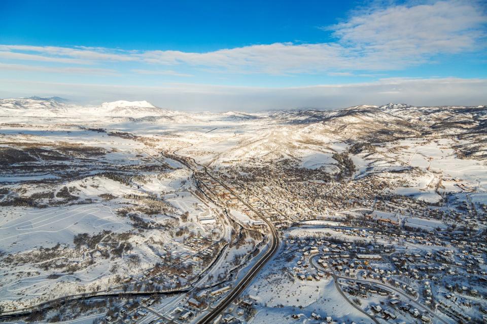 Steamboat springs, Colorado town from a hot air ballon midair during a sunny winer day.