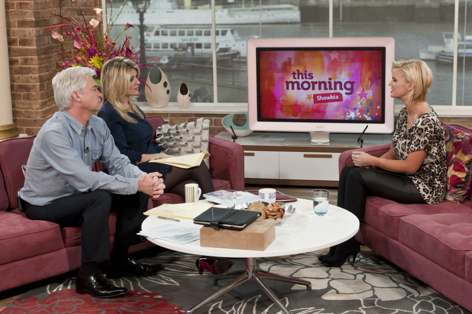 Phillip Schofield, Holly Willoughby and Kerry Katona on This Morning in 2011. (Shutterstock/ITV)