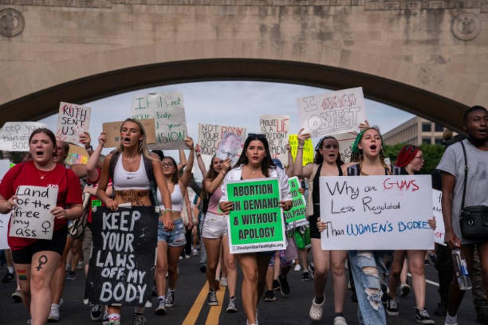 Abortion-rights activists march toward the White House after the Supreme Court overturns Roe v Wade (Getty Images)