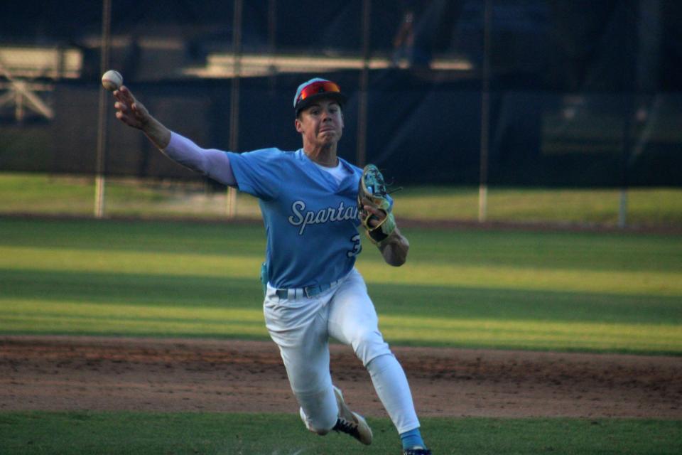 St. Johns Country Day third baseman Seth Alford throws to the plate during the FHSAA Region 1-2A high school baseball final.