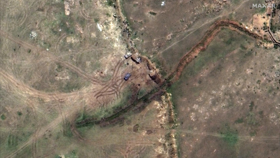 This satellite image provided by Maxar Technologies claims to show tanks positioned in the village of Serha in Eritrea, across the border from the town of Zalambessa in the Tigray region of northern Ethiopia on Monday, Sept. 19, 2022. New satellite imagery of one of the world's most reclusive nations shows military positions inside Eritrea near the border with Ethiopia's northern Tigray region, backing up witness accounts of a new, large-scale offensive. (Maxar Technologies via AP)