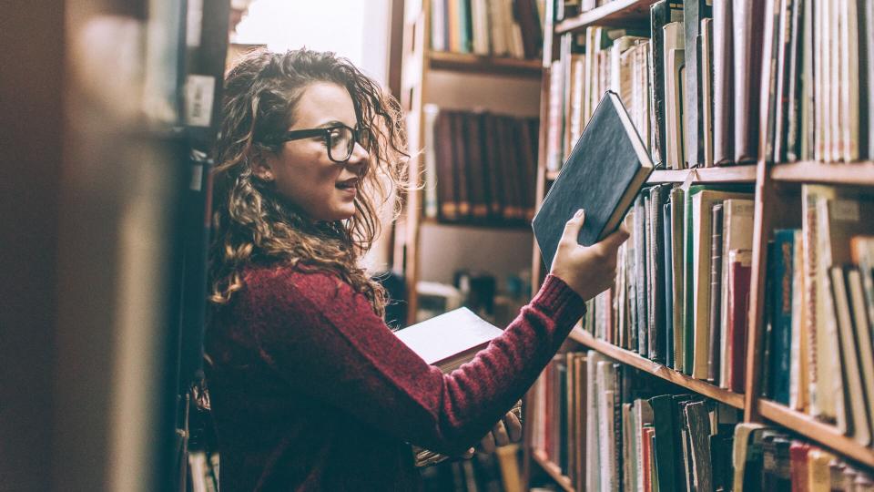 Young woman in library.