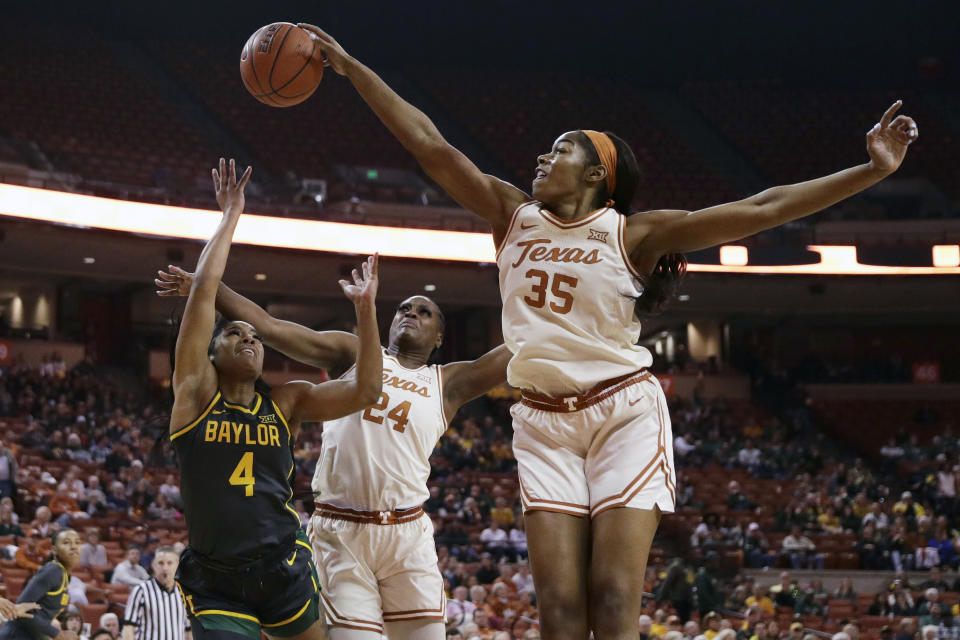 FILE - In this Friday, Jan. 31, 2020, file photo, Baylor guard Te'a Cooper (4) has her shot blocked by Texas forward Charli Collier (35) during the first half of an NCAA college basketball game, in Austin, Texas. The WNBA and the Players' Association have agreed to an opt-in process for this season's draft, the league confirmed to The Associated Press, late Sunday, March 7, 2021. Collier, who is a third-year junior, has announced her intent to forgo her remaining eligibility and enter the draft. Collier will turn 22 in September so she is draft-eligible. (AP Photo/Eric Gay, File)