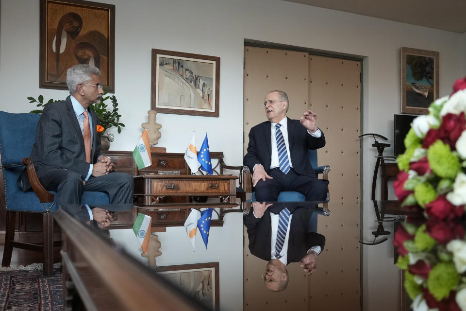 Cyprus' foreign minister Ioannis Kasoulides, right, and his Indian counterpart Subrahmanyam Jaishankar meet at the foreign house in capital Nicosia, Cyprus, Thursday, Dec. 29, 2022. Jaishankar is in Cyprus for a two-day official visit. (AP Photo/Petros Karadjias)