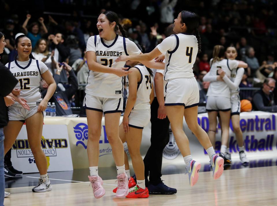 Monache's Ariel Bermudez, left, and Iris Lemus celebrate their victory against Tehachapi during their Central Section Division II high school girls basketball championship game at Selland Arena on Friday, Feb. 23, 2024 in Fresno, Calif. Monache won 41-37.
