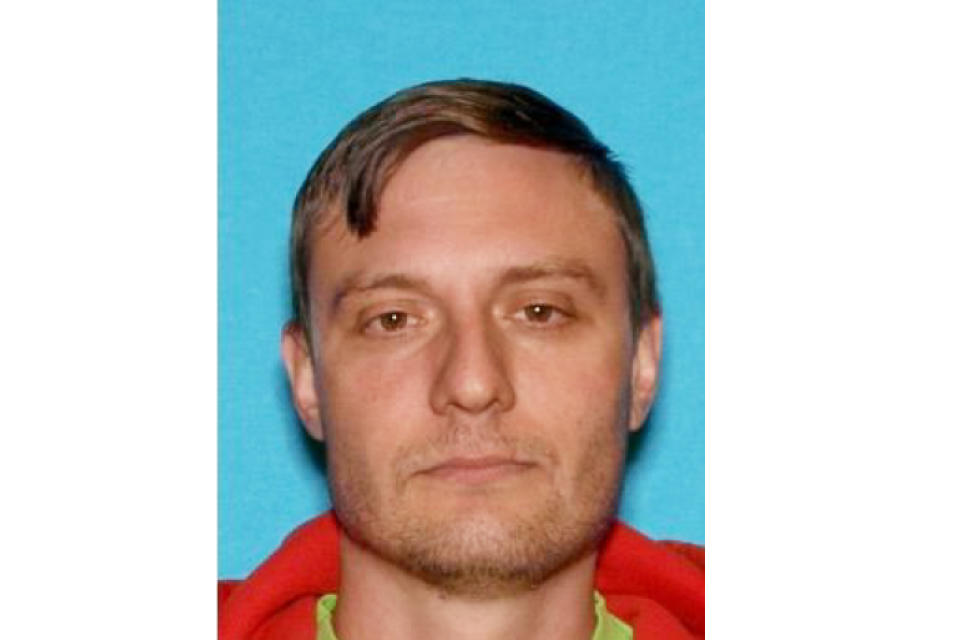 This undated Department of Motor Vehicles photo provided by the FBI shows Robert Alvin Justus Jr., who has been charged with aiding and abetting the murder and attempted murder of two Federal Protective Services security officers in a shooting in Oakland, Calif., on May 29, 2020, federal authorities announced Tuesday, June 16, 2020. Justus is accused of being the driver of a van from which U.S. Air Force Staff Sgt. Steven Carrillo allegedly shot and killed federal officer Dave Patrick Underwood, 53, and wounded of another officer outside the Ronald V. Dellums Federal Building on May 29. (FBI via AP)