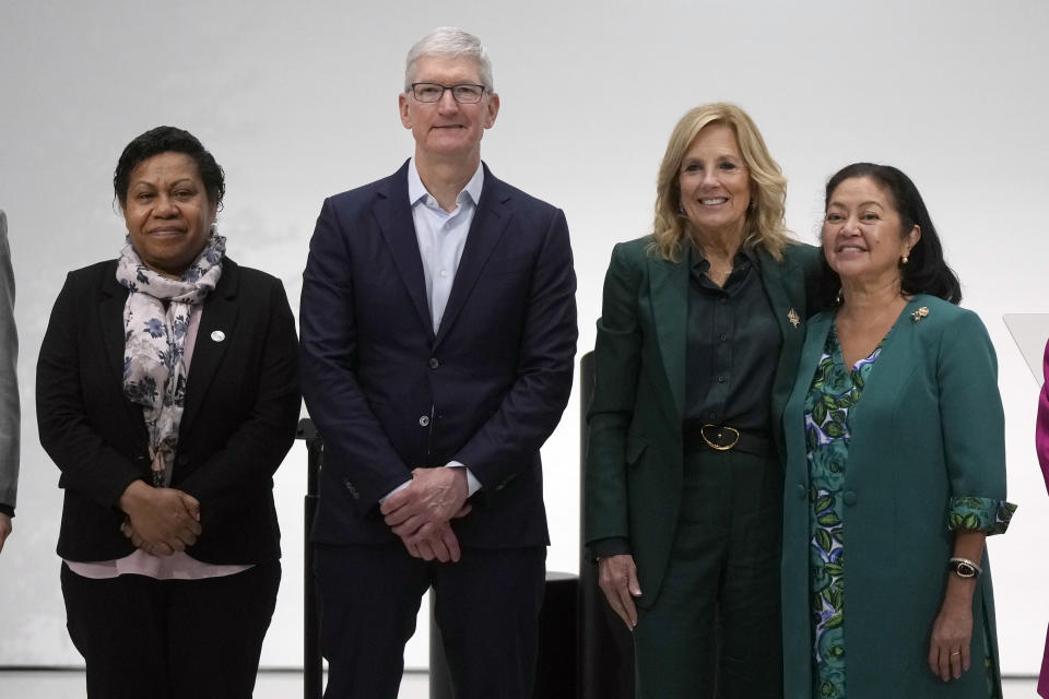 Rachael Marape, wife of Papua New Guinea's Prime Minister, from left, poses for photos with Apple CEO Tim Cook, first lady Jill Biden, and Philippines first lady Louise Araneta-Marcos after a discussion on mental health at a spousal program as part of the APEC Leaders' Week at the Apple campus in Cupertino, Calif., Friday, Nov. 17, 2023. (AP Photo/Jeff Chiu)