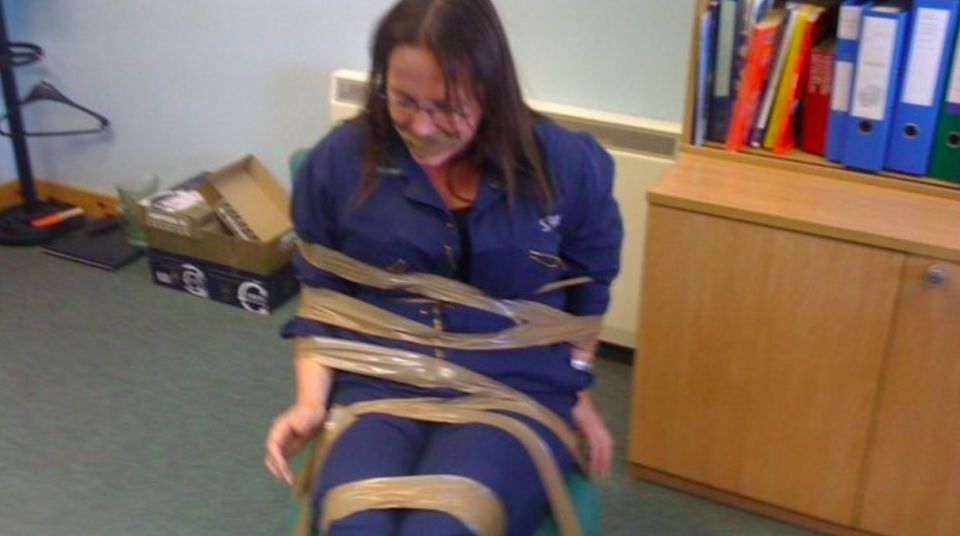 <em>DeeAnn Fitzpatrick was pictured tied up and gagged after reportedly complaining about the men at her workplace (BBC)</em>