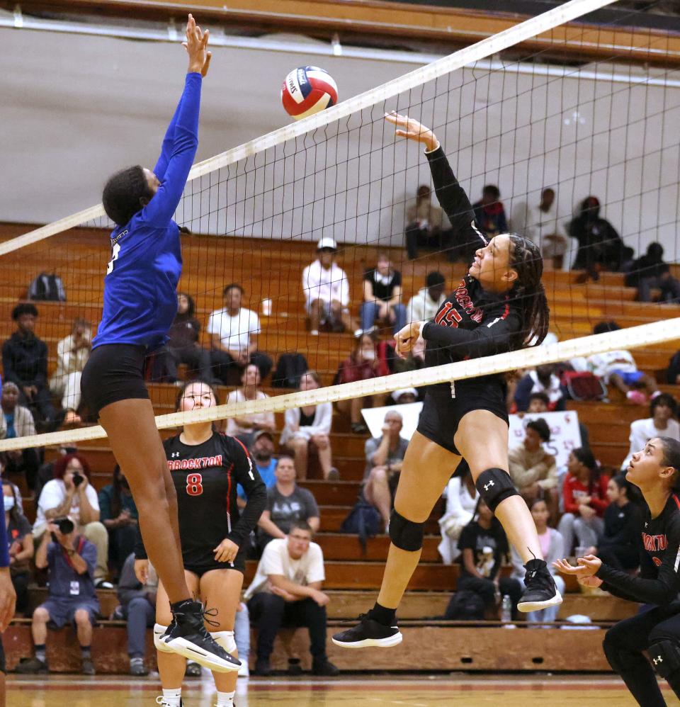 Brockton's Assata Sanor spikes the volleyball during a game versus Quincy on Wednesday, Sept. 7, 2022. 