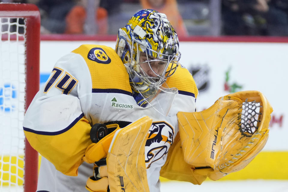 Nashville Predators' Juuse Saros blocks a shot during the second period of an NHL hockey game against the Philadelphia Flyers, Thursday, Dec. 21, 2023, in Philadelphia. (AP Photo/Matt Slocum)