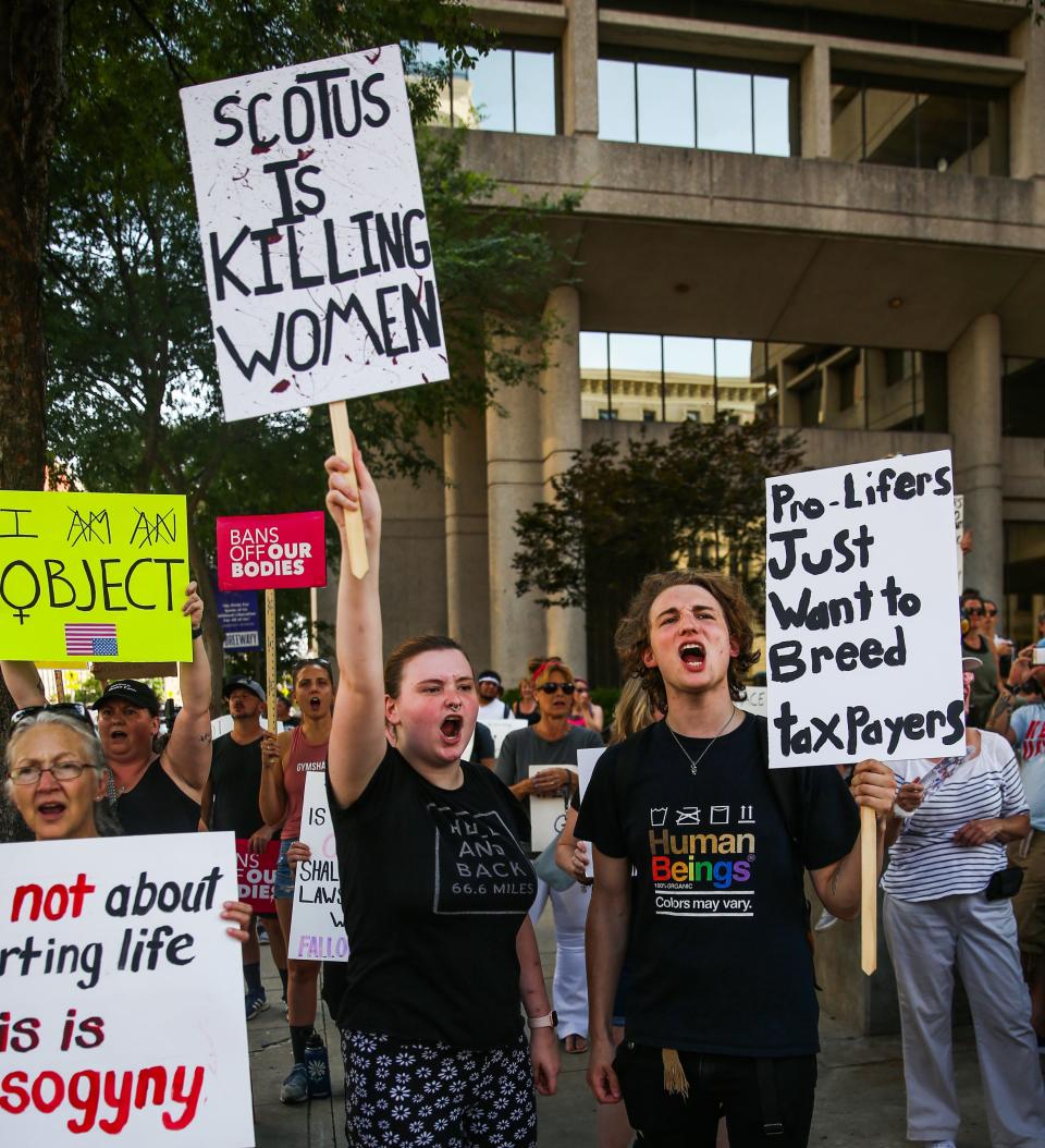 Protesters yell at the Rally for Women's Rights, a gathering supporting pro-choice, at Louisville Metro Hall in downtown Louisville on July 4, 2022. This comes after the Supreme Court overturned Roe V. Wade. 