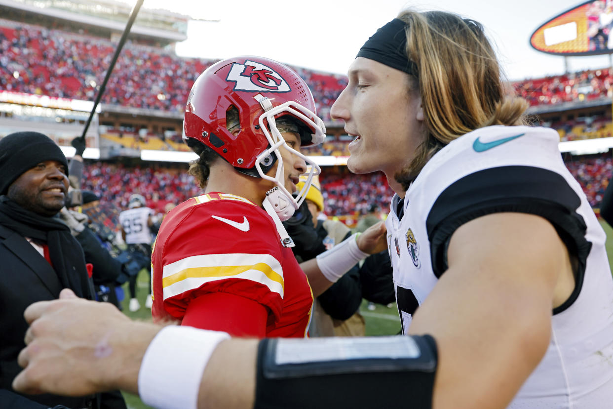 KANSAS CITY, MISSOURI - NOVEMBER 13: Patrick Mahomes #15 of the Kansas City Chiefs hugs Trevor Lawrence #16 of the Jacksonville Jaguars after the Chiefs defeated the Jaguars 27-17 at Arrowhead Stadium on November 13, 2022 in Kansas City, Missouri. (Photo by David Eulitt/Getty Images)