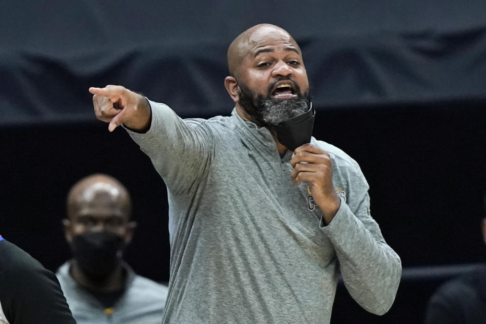 Cleveland Cavaliers head coach J.B. Bickerstaff yells instructions to players in the second half of an NBA basketball game against the Phoenix Suns, Tuesday, May 4, 2021, in Cleveland. Phoenix won 134-118 in overtime. (AP Photo/Tony Dejak)