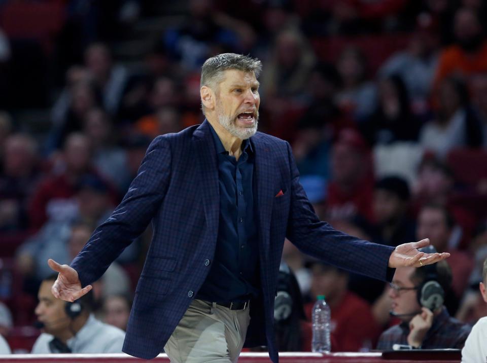 Oklahoma head coach Porter Moser argues a call during the Sooners' 71-61 loss to Oklahoma State on Wednesday at Lloyd Noble Center in Norman.