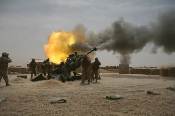 PHOTO: Marines from Battery M, 3rd Battalion, 11th Marine Regiment fire an M777 howitzer during a training exercise aboard Camp Fallujah, Iraq, April 19, 2008. (U.S. Marine Corps)