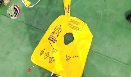 A life jacket, part of recovered debris of the EgyptAir jet that crashed in the Mediterranean Sea, is seen in this still image taken from video on May 21, 2016. Egyptian Military/Handout via Reuters TV