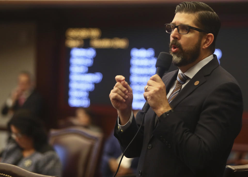 Sen. Manny Diaz, Jr., R-Hialeah, closes on his Senate Bill 7030: Implementation of Legislative Recommendations of the Marjory Stoneman Douglas High School Public Safety Commission, Tuesday, April 23, 2019, in the Florida Senate in Tallahassee, Fla. The bill passed 22-17. (AP Photo/Phil Sears)