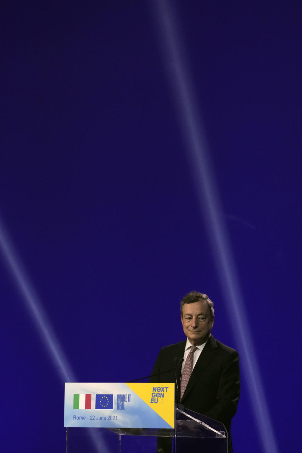 Italian Premier Mario Draghi speaks to the media during a joint news conference with European Commission President Ursula von der Leyen, at the Cinecitta' studios in Rome, Tuesday, June 22, 2021. (AP Photo/Andrew Medichini)