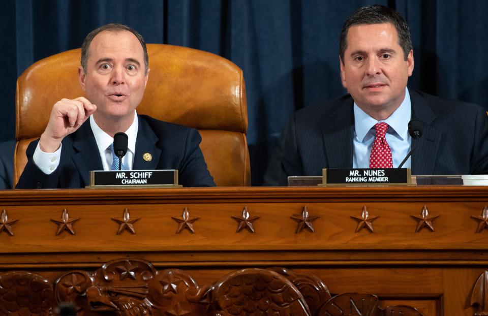 Chairman Adam Schiff (L), Democrat of California, and Ranking Member Devin Nunes (R), Republican of California, during the first public hearings held by the House Permanent Select Committee on Intelligence as part of the impeachment inquiry into US President Donald Trump, Nov. 13, 2019.
