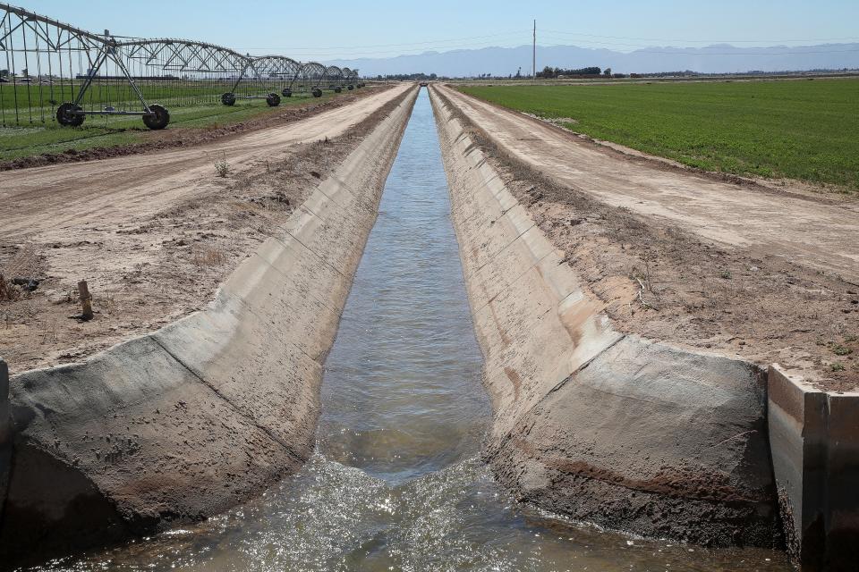 A canal transports water to farmland in Imperial, California.