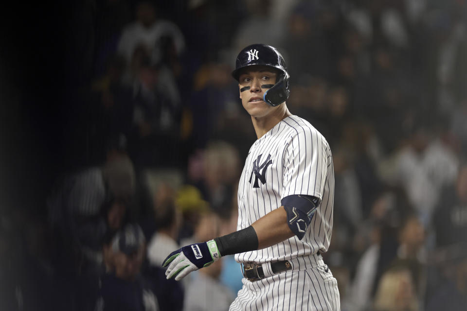 New York Yankees' Aaron Judge walks back to the dugout after striking out during the fifth inning of the team's baseball game against the Boston Red Sox on Friday, Sept. 23, 2022, in New York. (AP Photo/Adam Hunger)