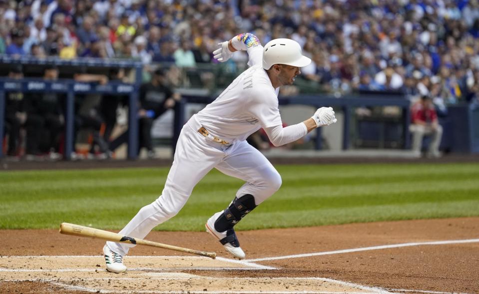 Milwaukee Brewers' Ryan Braun hits an RBI single during the first inning of a baseball game against the Arizona Diamondbacks Friday, Aug. 23, 2019, in Milwaukee. (AP Photo/Morry Gash)