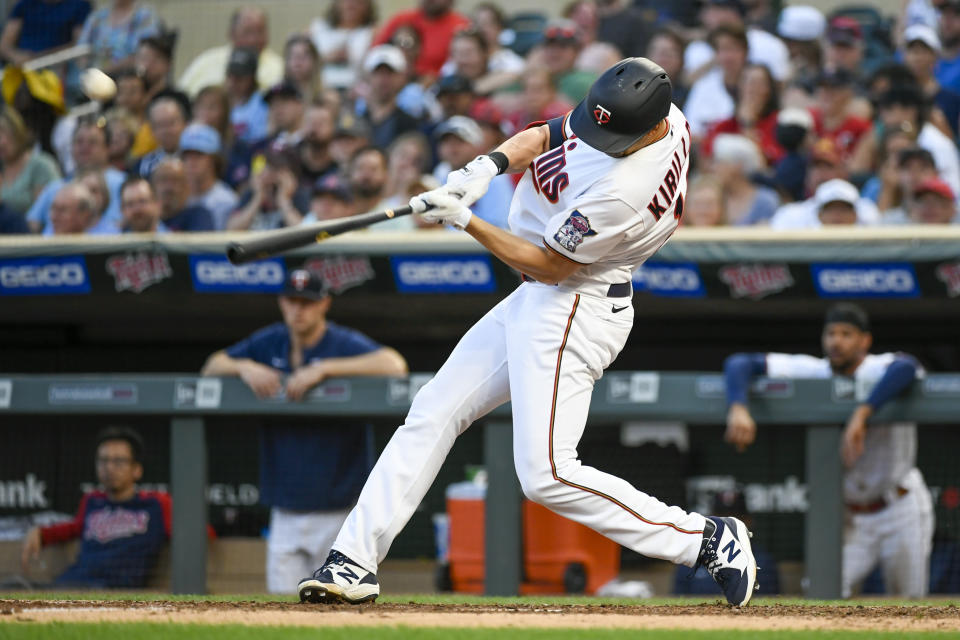Minnesota Twins' Alex Kirilloff hits a double, driving in two runs, against the Colorado Rockies during the seventh inning of a baseball game, Saturday, June 25, 2022, in Minneapolis. Kyle Garlick and Max Kepler scored. (AP Photo/Craig Lassig)