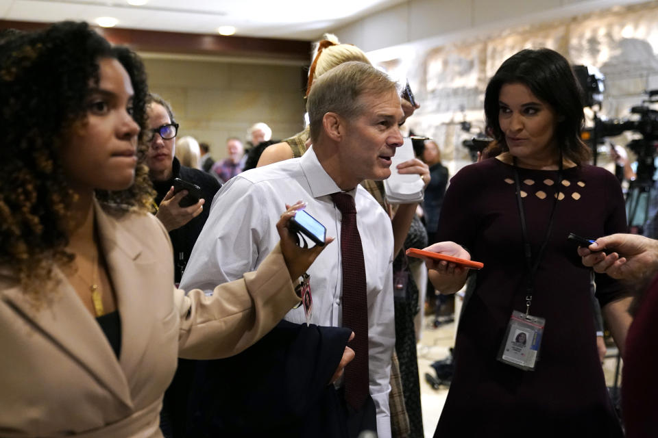 FILE - Rep. Jim Jordan, R-Ohio, speaks with journalists as he walks to a House Republican leadership meeting, Nov. 15, 2022, on Capitol Hill in Washington. Even with their threadbare House majority, Republicans doubled down this week on using their new power to investigate the Biden administration and in particular the president’s son. (AP Photo/Patrick Semansky)