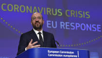 European Council President Charles Michel speaks during a media conference on the European Union response to the COVID-19 crisis at EU headquarters in Brussels, Wednesday, April 15, 2020. The European Union moved Wednesday to head off a chaotic and potentially disastrous easing of restrictions that are limiting the spread of the coronavirus, warning its 27 nations to move very cautiously as they return to normal life and base their actions on scientific advice. (John Thys, Pool Photo via AP)