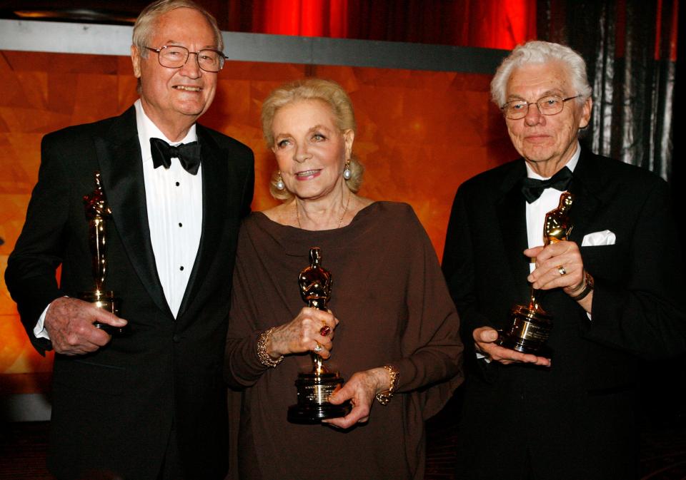 Actress Lauren Bacall (center), cinematographer Gordon Willis (right) and filmmaker Roger Corman pose with their Honorary Oscars at the Academy of Motion Picture Arts & Sciences 2009 Governors Awards in Hollywood, California November 14, 2009.