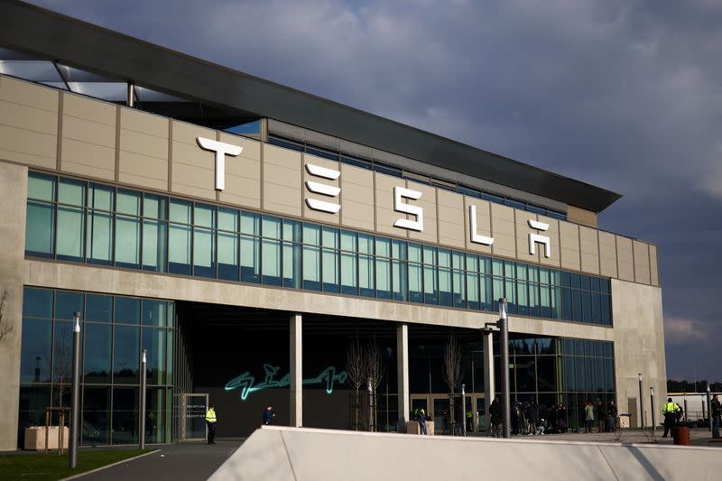 Tesla's Gigafactory halts its production after a suspected arson attack, in Gruenheide