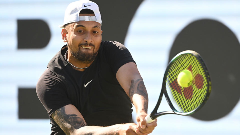 Nick Kyrgios plays a backhand at the Stuttgart Open.