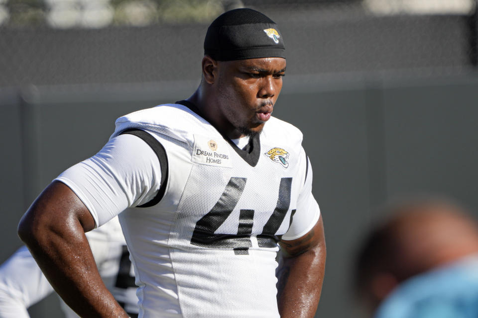 Jacksonville Jaguars linebacker Travon Walker (44) warms up during a practice at NFL football training camp, Saturday, July 29, 2023, in Jacksonville, Fla. (AP Photo/John Raoux)