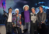 Small Faces/Faces members Ron Wood, left, Ian McLagan, second from left, and Kenney Jones, right, stand with Simply Red lead singer Mick Hucknall, second from right and bassist Conrad Korsch after performing at the Rock and Roll Hall of Fame indiction ceremonies Saturday, April 14, 2012, in Cleveland. Small Faces/Faces were inducted into the Rock Hall. (AP Photo/Tony Dejak)