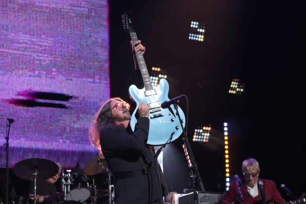 Dave Grohl performing at the 2024 Love Rocks NYC benefit concert. - Credit: Kevin Mazur/Getty Images