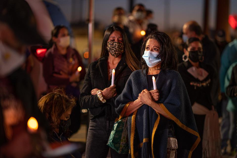 Celia Chacon on Wednesday, March 10, 2021, attends a vigil to honor her husband Ernie Chacon, who died of COVID-19 on Dec. 11, 2020. Health care workers and community members held the candlelight vigil outside Las Palmas Medical Center to honor lives lost on the one-year anniversary of the start of the COVID-19 pandemic.