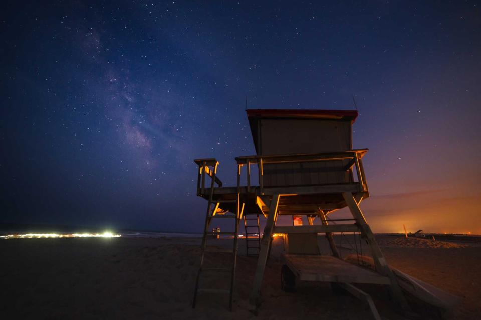 The Milky Way rises over the Assateague Island, VA beach very early on a summer evening. Dark skies on the National Seashore allow for great star gazing opportunities.