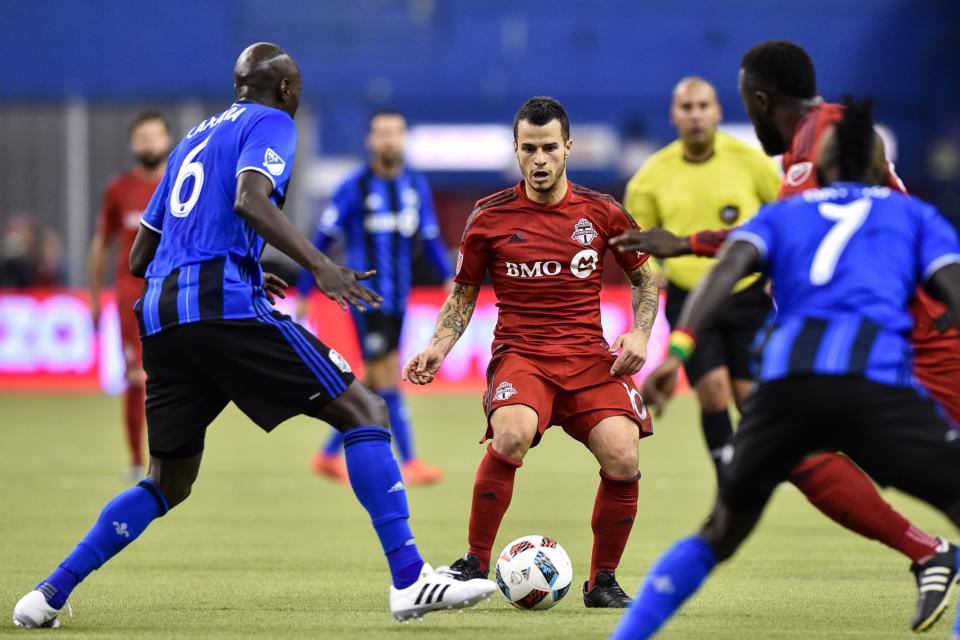 <p>It was 10 years in the making, but Toronto FC finally won an MLS playoff game. Sebastian Giovinco continued to shine in his second season with the club and the rest of the squad stepped up to get the team to the Eastern Conference final. (Photo by Minas Panagiotakis/Getty Images) </p>