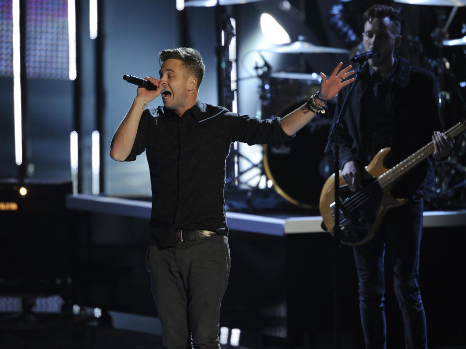 Ryan Tedder, of the musical group OneRepublic, performs "Counting Stars" on stage at the 40th annual People's Choice Awards at the Nokia Theatre L.A. Live on Wednesday, Jan. 8, 2014, in Los Angeles. (Photo by Chris Pizzello/Invision/AP)