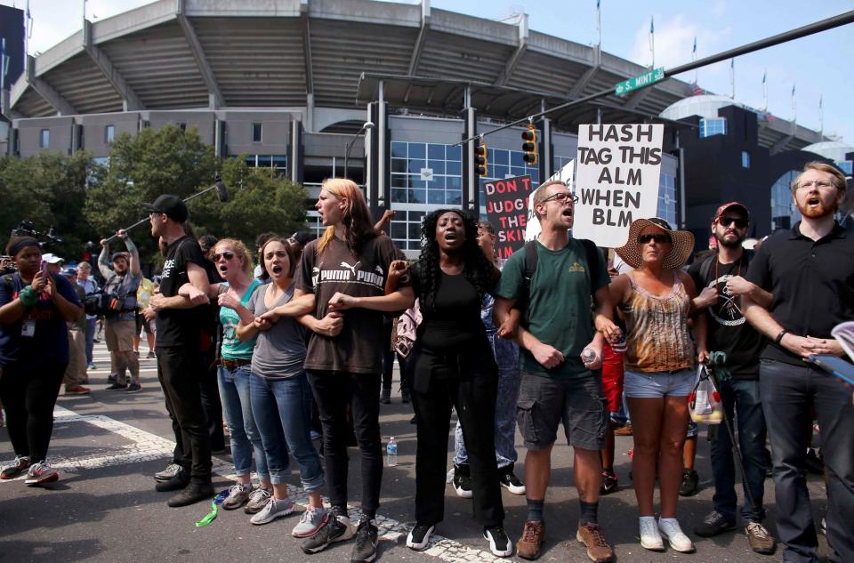 <p>People gather outside the football stadium as the NFL’s Carolina Panthers host the Minnesota Vikings, to protest the police shooting of Keith Scott, in Charlotte, North Carolina, U.S., September 25, 2016. REUTERS/Mike Blake </p>