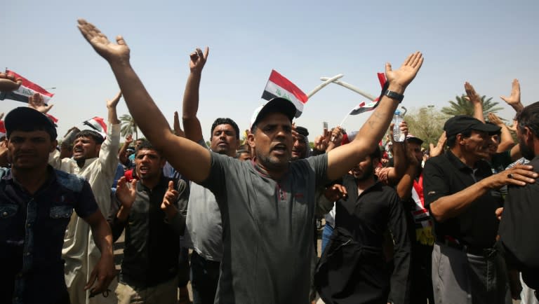 Supporters of Shiite cleric Moqtada al-Sadr gather in the parade grounds outside the parliament in Baghdad's heavily fortified "Green Zone" on May 1, 2016