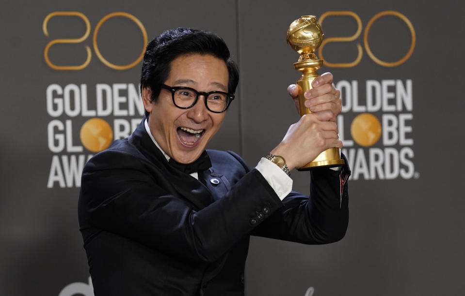 Ke Huy Quan poses in the press room with the award for best performance by an actor in a supporting role in any motion picture for "Everything Everywhere All at Once" at the 80th annual Golden Globe Awards at the Beverly Hilton Hotel on Tuesday, Jan. 10, 2023, in Beverly Hills, Calif. (Photo by Chris Pizzello/Invision/AP)