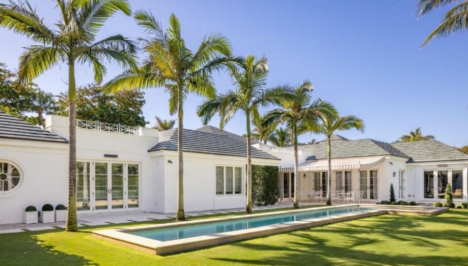 A lap pool stretches behind the main house at 710 S. County Road in Palm Beach. The 1.3-acre estate has been listed for sale at $54.9 million.