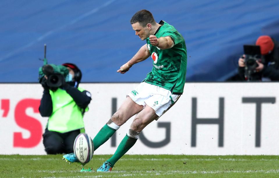 Johnny Sexton kicks a late penalty for Ireland (PA)