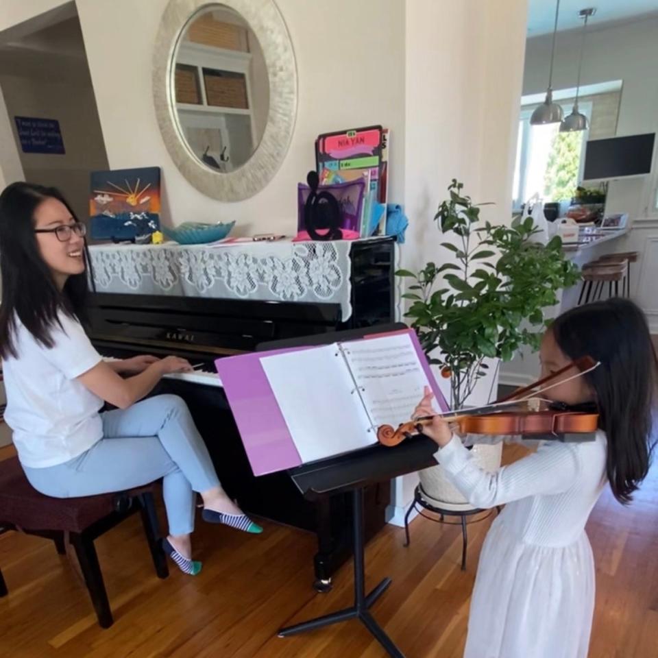 Shine Hwang (at piano) tries to keep music lessons fun.