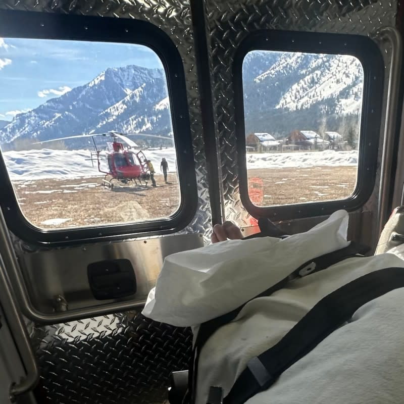 Durtschi looks out at the Teton County Search & Rescue helicopter after being loaded into the ambulance.<p>Courtesy: Tim Durtschi</p>