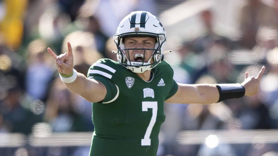 FILE - Ohio quarterback Kurtis Rourke (7) gestures during an NCAA college football game against Akron, Saturday, Oct. 8, 2022, in Athens, Ohio. Last season, Ohio quarterback Kurtis Rourke had the Bobcats on the cusp of winning their first Mid-American Conference crown since 1968. Then he tore his anterior cruciate ligament and Ohio lost its fifth league championship game. Nine months later, the MAC's reigning offensive player of the year is nearing the end of his rehab schedule and about to start a new quest. (AP Photo/Emilee Chinn, File)